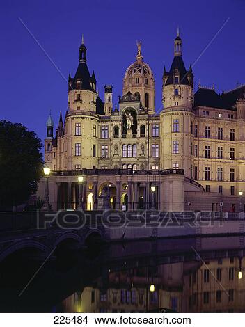 Picture - Reflection of castle in lake, Mecklenburg-Western Pomerania, Germany . Fotosearch
