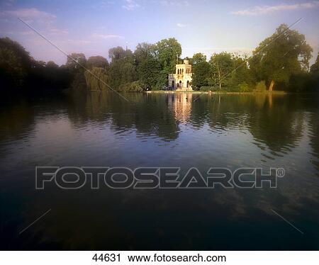 Stock Image - Reflection of palace and trees in water, Biebrich Palace, Wiesbaden, Germany . Fotosearch