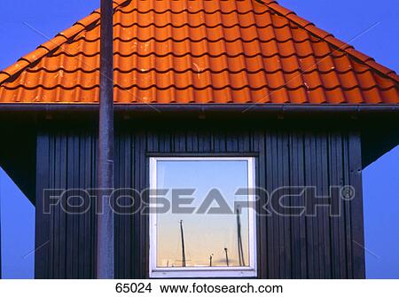 Picture - Reflection of street lights on window glass . Fotosearch