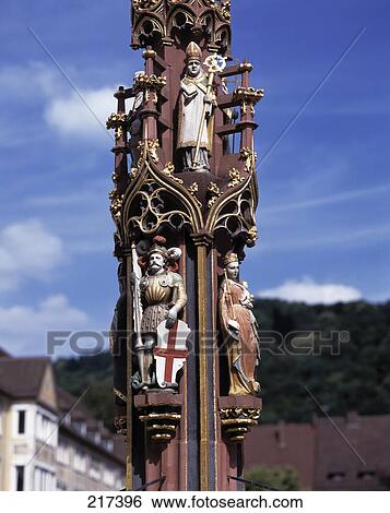Stock Photograph - Religious figurines on column, Black Forest, Baden-Wurttemberg, Germany . Fotosearch