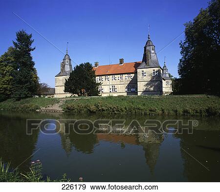River flowing in front of castle, Castle Of Westerwinkel, Germany View Large Photo Image Stock Photo - River flowing in front of castle, Castle Of Westerwinkel, Germany . Fotosearch