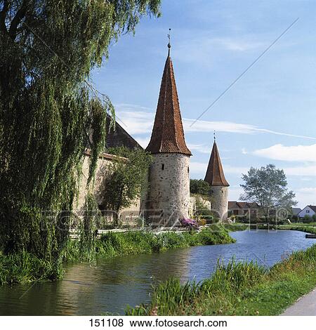 River flowing through village, Franconia, Bavaria, Germany View Large Photo Image Stock Photo - River flowing through village, Franconia, Bavaria, Germany . Fotosearch