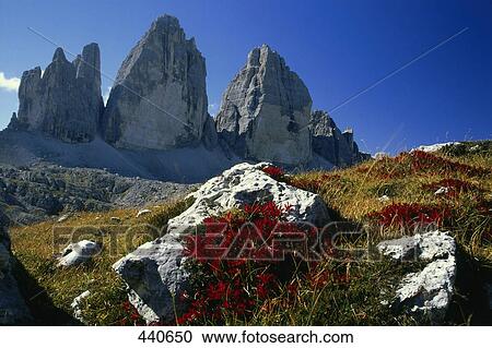 Stock Image - Rock formations on landscape, Tre Cime di Lavaredo, Dolomites, Italy . Fotosearch