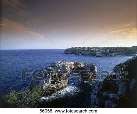 Rock formations on the coast, Cala Santanyi, Mallorca, Balearic Islands, Spain View Large Photo Image Stock Photo - Rock formations on the coast, Cala Santanyi, Mallorca, Balearic Islands, Spain . Fotosearch