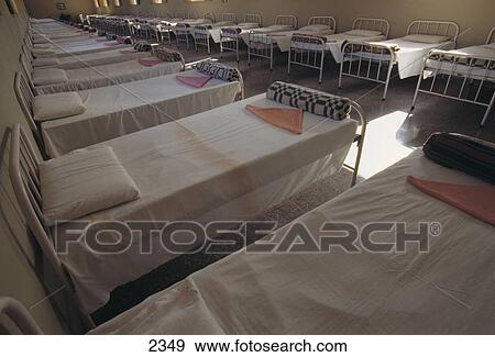Stock Photo - Rows of empty beds in hospital, Havana, Cuba . Fotosearch