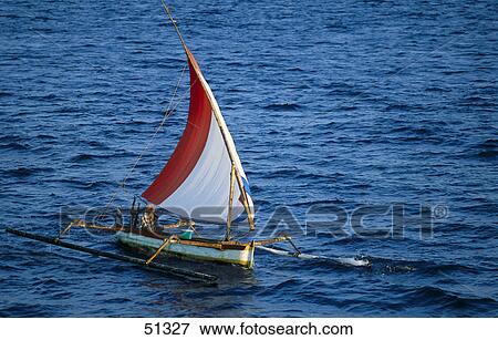 Sailboat in sea at sunset, Lombok, Indonesia View Large Photo Image Stock Photo - Sailboat in sea at sunset, Lombok, Indonesia . Fotosearch