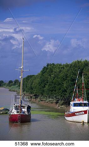 Stock Photo - Sailboats at riverside, Garonne River, Port de Richard, France, Europe . Fotosearch