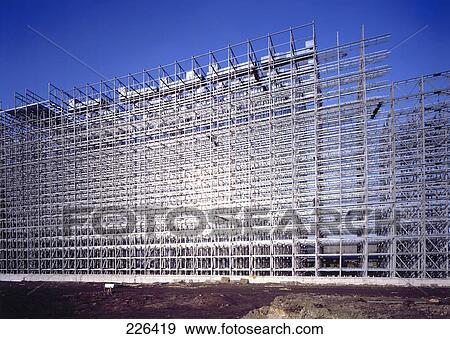Scaffolding at construction site, Essen, Germany View Large Photo Image Stock Photo - Scaffolding at construction site, Essen, Germany . Fotosearch