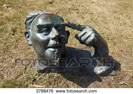 Stock Photograph - Sculpture "Klugscheisser", Dormagen, North Rhine-Westphalia, Germany, Europe . Fotosearch