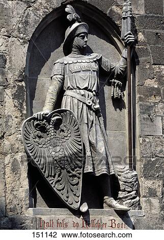 Stock Image - Sculpture of warrior on wall, Cologne, Germany . Fotosearch