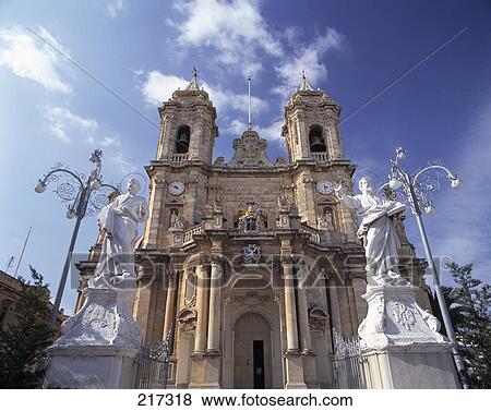 Stock Photo - Sculptures in front of cathedral . Fotosearch