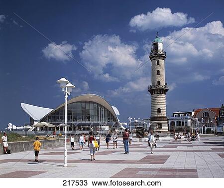 Seafront with lighthouse, Warnemuende, Rostock, Germany View Large Photo Image Stock Image - Seafront with lighthouse, Warnemuende, Rostock, Germany . Fotosearch