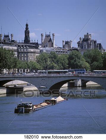 Ship near bridge in city, Seine River, Paris, France View Large Photo Image Stock Image - Ship near bridge in city, Seine River, Paris, France . Fotosearch