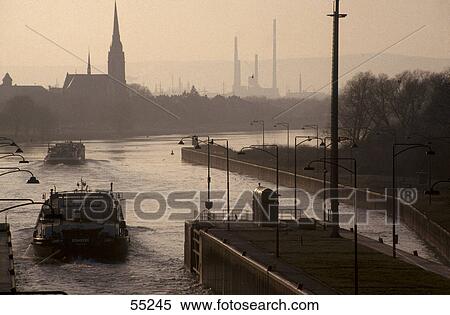 Silhouette of ship in sluice, Main River, Frankfurt, Hessen, Germany View Large Photo Image Stock Photography - Silhouette of ship in sluice, Main River, Frankfurt, Hessen, Germany . Fotosearch