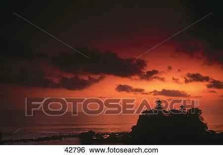 Stock Photograph - Silhouette of temple at coast, Tanah Lot Temple, Bali, Indonesia . Fotosearch