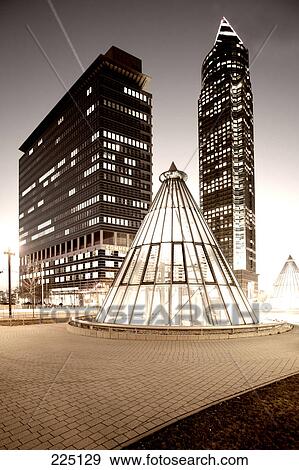 Skyscrapers lit up in city, Messeturm Tower, Frankfurt, Hesse, Germany View Large Photo Image Stock Photo - Skyscrapers lit up in city, Messeturm Tower, Frankfurt, Hesse, Germany . Fotosearch