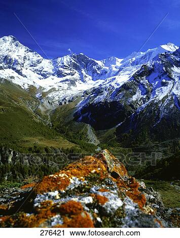 Snowcapped mountains under blue sky, Mt Weisshorn, Val de Zinal, Valais Canton, Switzerland View Large Photo Image Stock Image - Snowcapped mountains under blue sky, Mt Weisshorn, Val de Zinal, Valais Canton, Switzerland . Fotosearch