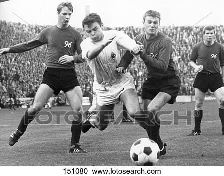 Soccer players playing in stadium, Boekelberg Stadium, Hanover, Germany View Large Photo Image Stock Image - Soccer players playing in stadium, Boekelberg Stadium, Hanover, Germany . Fotosearch