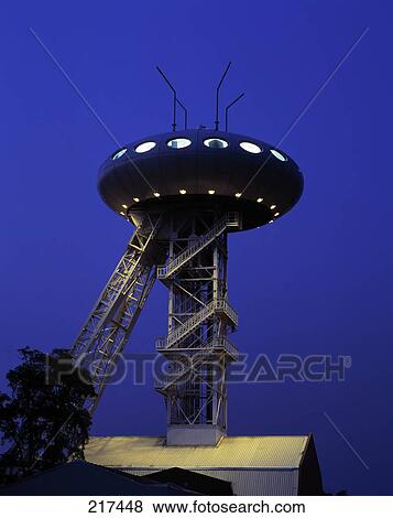 Stock Photo - Staircase leading to lit up building against clear blue sky, Brandenburg, Germany . Fotosearch