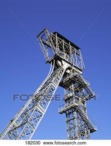 Stairs leading to metal tower against blue sky, Dortmund, Germany View Large Photo Image Stock Image - Stairs leading to metal tower against blue sky, Dortmund, Germany . Fotosearch