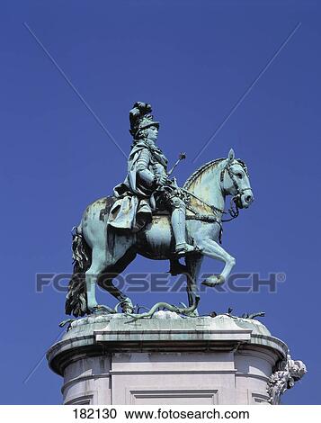 Stock Image - Statue against blue sky, Dom Jose Statue, Praca Do Comercio, Lisbon, Portugal . Fotosearch
