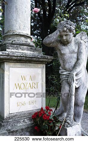 Statue at cemetery, Mozart Grab, Vienna, Austria View Large Photo Image Stock Image - Statue at cemetery, Mozart Grab, Vienna, Austria . Fotosearch