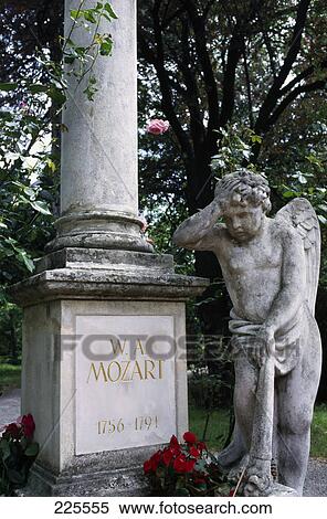 Stock Photography - Statue at cemetery, Mozart Grab, Vienna, Austria . Fotosearch