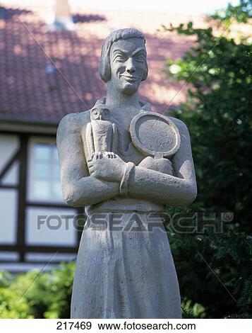 Stock Photo - Statue in front of building, Till Eulenspiegel Monument, Wolfenbuettel, Lower Saxony, Germany . Fotosearch