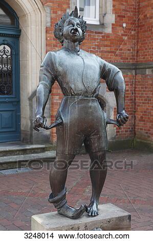Statue in front of the tax office of Quakenbrueck, Germany View Large Photo Image Picture - Statue in front of the tax office of Quakenbrueck, Germany . Fotosearch