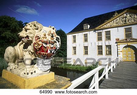 Stock Image - Statue of lion at entrance of castle, Germany . Fotosearch