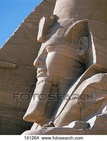 Picture - Statue of Rameses II carved on temple, Abu Simbel, Egypt . Fotosearch