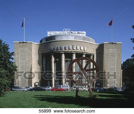 Statue of wheel in park in front of theater, Volksbuehne, Berlin, Germany, Europe View Large Photo Image Stock Photo - Statue of wheel in park in front of theater, Volksbuehne, Berlin, Germany, Europe . Fotosearch