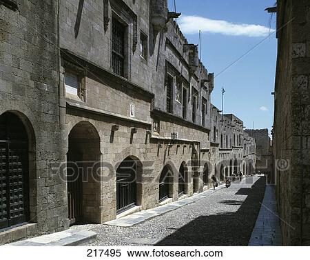 Stock Photography - Stone houses along street, Odos Ippoton, Rhodes, Dodecanese Islands, Greece . Fotosearch
