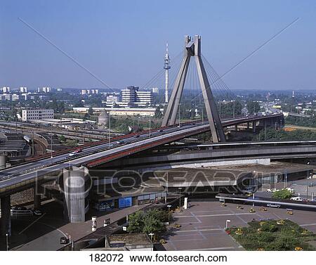 Suspension bridge in city, Germany View Large Photo Image Stock Image - Suspension bridge in city, Germany . Fotosearch