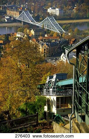 Stock Image - Suspension railway bridge across river, Elbe River, Blaues Wunder, Dresden, Saxony, Germany . Fotosearch