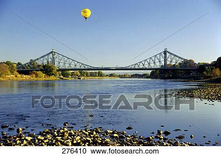 Suspension railway bridge across river, Elbe River, Blaues Wunder, Dresden, Saxony, Germany View Large Photo Image Stock Image - Suspension railway bridge across river, Elbe River, Blaues Wunder, Dresden, Saxony, Germany . Fotosearch
