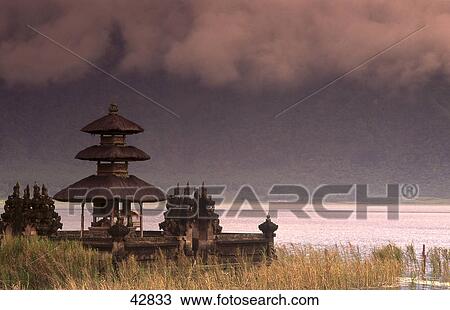 Temple at lakeside, Pura Ulun Danu Temple, Lake Bratan, Pura Ulun Danu Temple, Bali, Indonesia View Large Photo Image Stock Image - Temple at lakeside, Pura Ulun Danu Temple, Lake Bratan, Pura Ulun Danu Temple, Bali, Indonesia . Fotosearch
