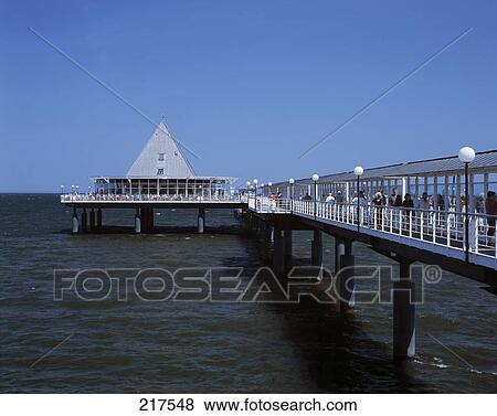 Tourists at covered pier, Mecklenburg-Vorpommern, Germany View Large Photo Image Stock Photo - Tourists at covered pier, Mecklenburg-Vorpommern, Germany . Fotosearch