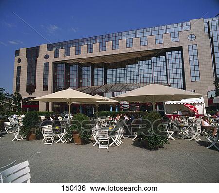 Tourists at outdoor cafe, Cologne, Germany View Large Photo Image Stock Photograph - Tourists at outdoor cafe, Cologne, Germany . Fotosearch