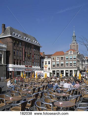 Stock Photo - Tourists at outdoor cafe, The Hague, Netherlands . Fotosearch