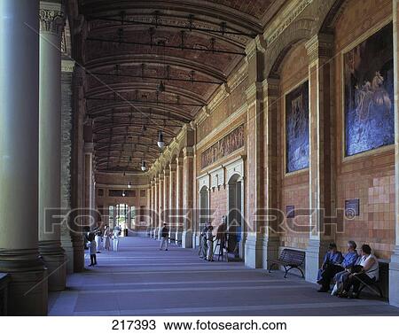 Stock Image - Tourists in corridor, Baden-Baden, Baden-Wurttemberg, Germany . Fotosearch