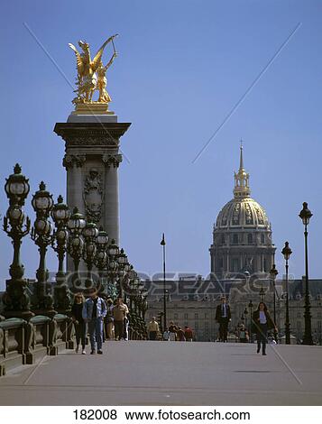 Tourists in front of cathedral, Les Invalides Church, Pont Alexandre III, Paris, France View Large Photo Image Stock Photo - Tourists in front of cathedral, Les Invalides Church, Pont Alexandre III, Paris, France . Fotosearch