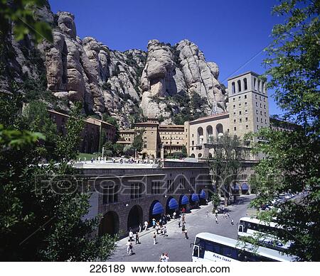 Stock Photo - Tourists in front of monastery, Spain . Fotosearch