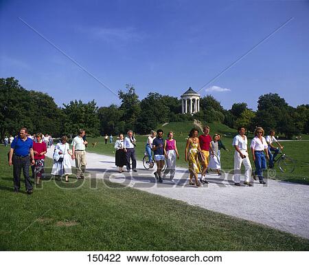 Tourists in garden, Munich, Germany View Large Photo Image Stock Image - Tourists in garden, Munich, Germany . Fotosearch