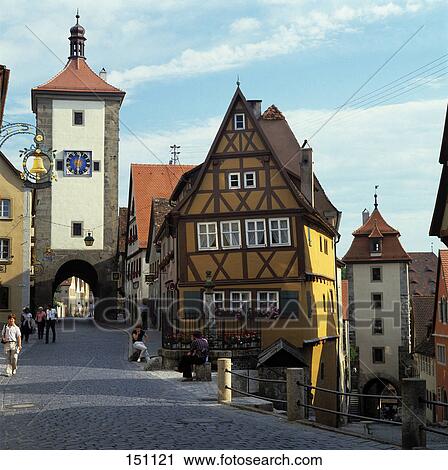 Stock Image - Tourists in town street, Franconia, Bavaria, Germany . Fotosearch