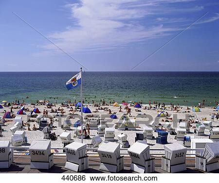 Stock Photograph - Tourists on beach . Fotosearch