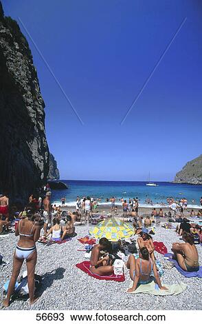 Tourists on beach, Torrent de Pareis, Sa Calobra, Majorca, Balearic Islands, Spain View Large Photo Image Stock Image - Tourists on beach, Torrent de Pareis, Sa Calobra, Majorca, Balearic Islands, Spain . Fotosearch