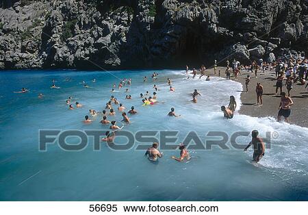 Tourists on beach, Torrent de Pareis, Sa Calobra, Majorca, Balearic Islands, Spain View Large Photo Image Stock Photography - Tourists on beach, Torrent de Pareis, Sa Calobra, Majorca, Balearic Islands, Spain . Fotosearch
