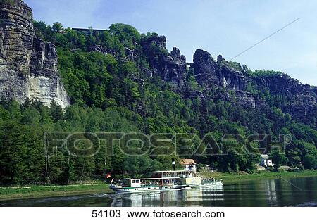 Tourists on steamboat in river, Elbe River, Bastei, Saxony, Germany View Large Photo Image Stock Image - Tourists on steamboat in river, Elbe River, Bastei, Saxony, Germany . Fotosearch