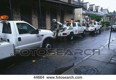 Tow trucks on road, French Quarter, New Orleans, Louisiana, USA View Large Photo Image Picture - Tow trucks on road, French Quarter, New Orleans, Louisiana, USA . Fotosearch